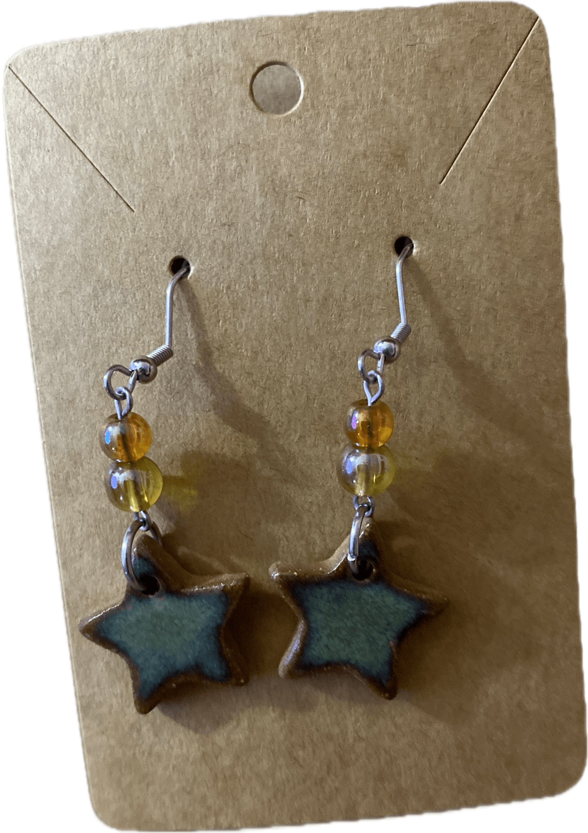 Ceramic blue-colored star-shaped earrings